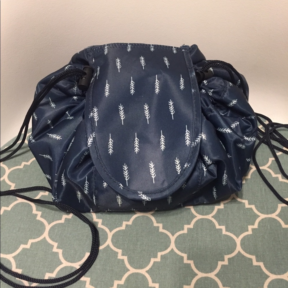 Lay and go style cosmetic bag. Like New.